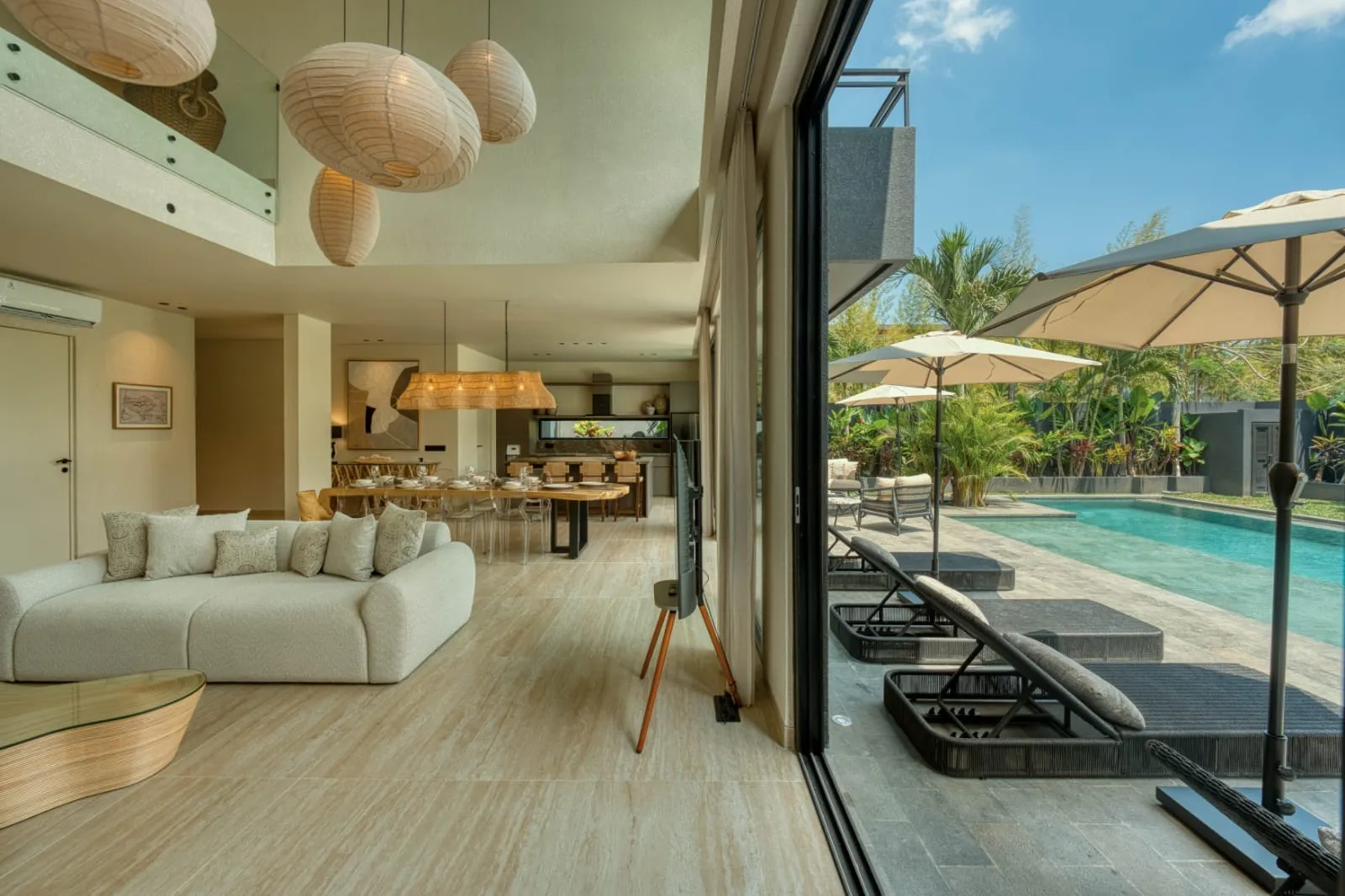Living room open to the pool